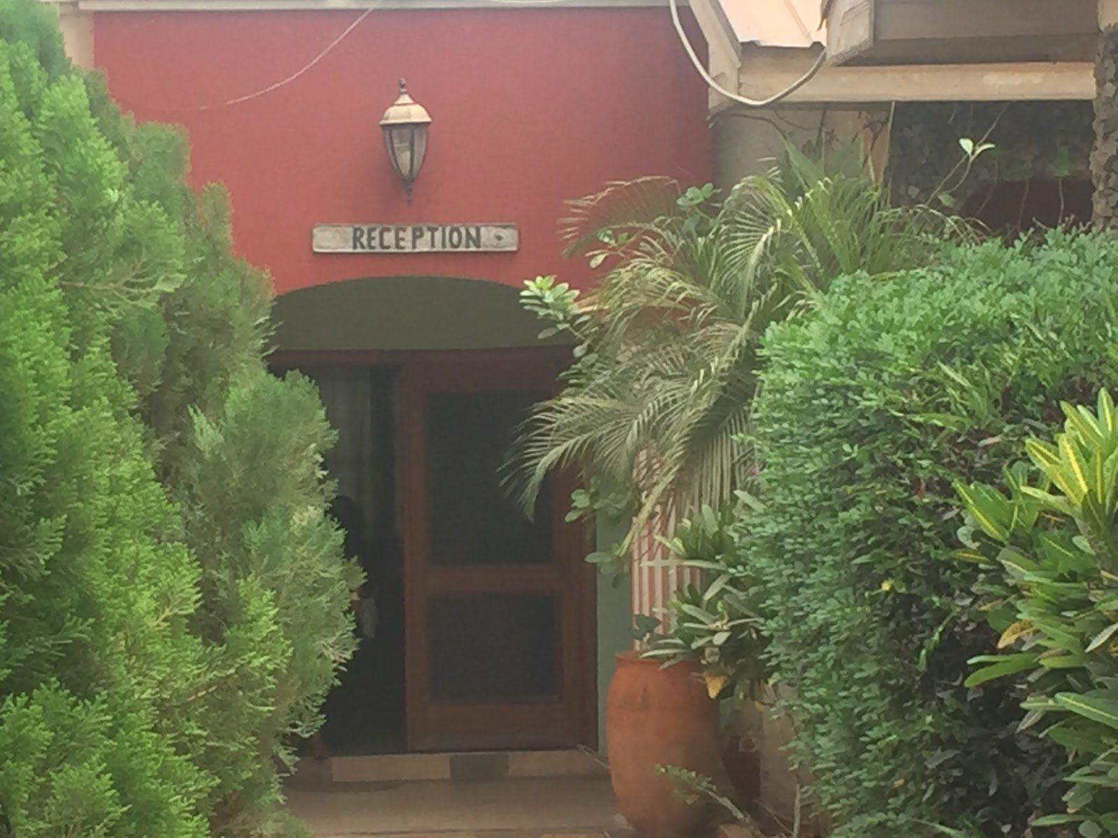 Kyerewaa Hotel reception entrance surrounded by greenery